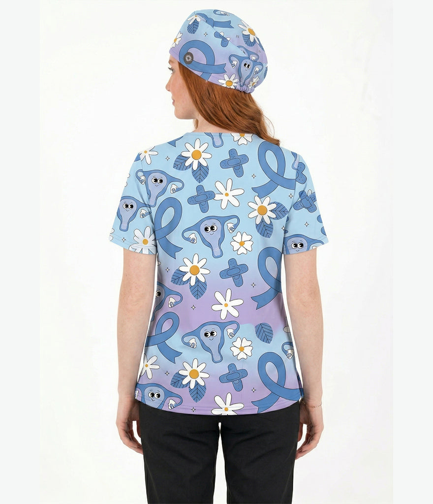 Person wearing a blue scrub top with medical symbol pattern on a white background