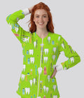 Women's lime green dental scrub jacket with cartoon tooth and toothbrush pattern by Resan.
